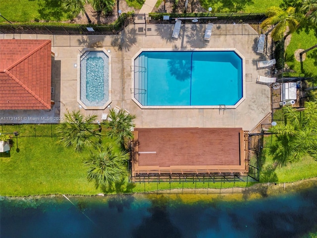 birds eye view of property featuring a water view