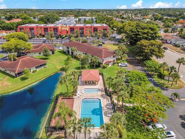 drone / aerial view with a water view