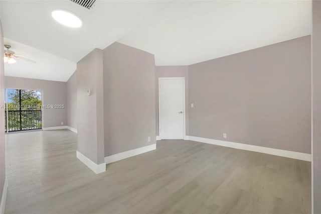 unfurnished room featuring light hardwood / wood-style floors and ceiling fan