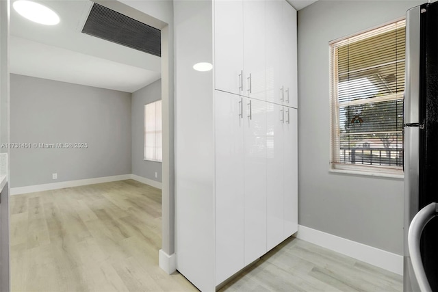 bathroom featuring wood-type flooring