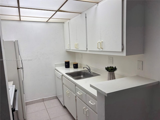 10744 N Kendall Dr Unit M11, Miami, FL 33176 - kitchen with stove, light tile patterned flooring, light countertops, a sink, and white dishwasher