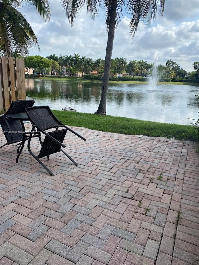 view of patio / terrace featuring a water view