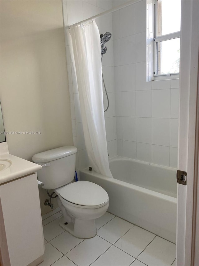 full bathroom featuring vanity, toilet, tile patterned flooring, and shower / bath combo