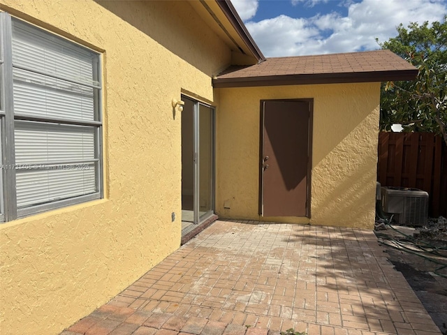 view of patio / terrace with central AC unit