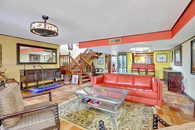 living room with tile patterned floors