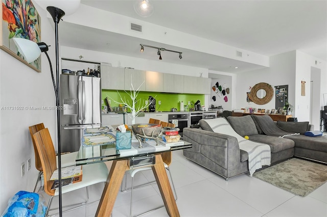 living room with light tile patterned floors