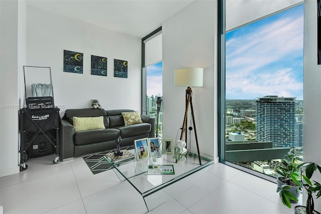 tiled living room with floor to ceiling windows and a wealth of natural light