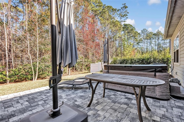 view of patio featuring a hot tub