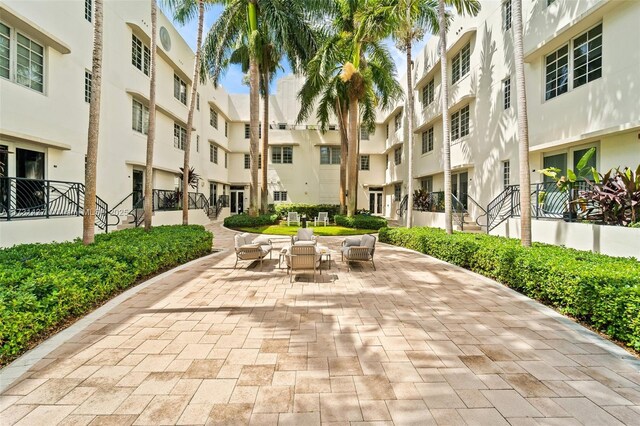 view of community with a patio area