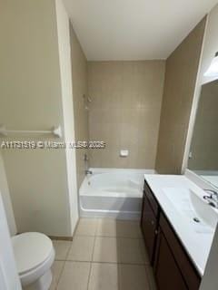 full bathroom with vanity, tile patterned floors, bathing tub / shower combination, and toilet