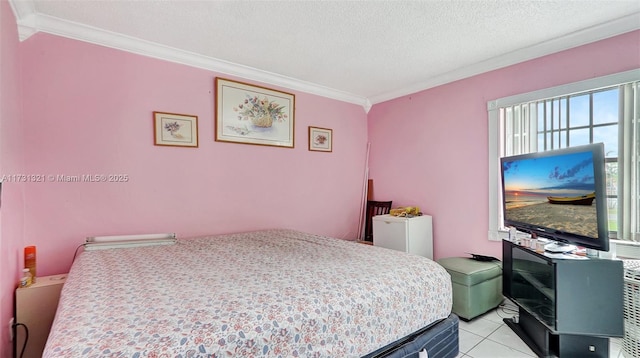 tiled bedroom with crown molding and a textured ceiling