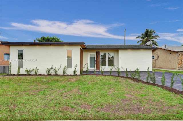 exterior space with a front yard