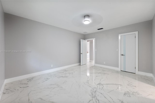 spare room featuring ceiling fan