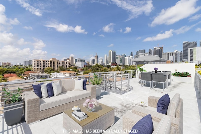 view of patio / terrace featuring an outdoor living space and an outdoor bar