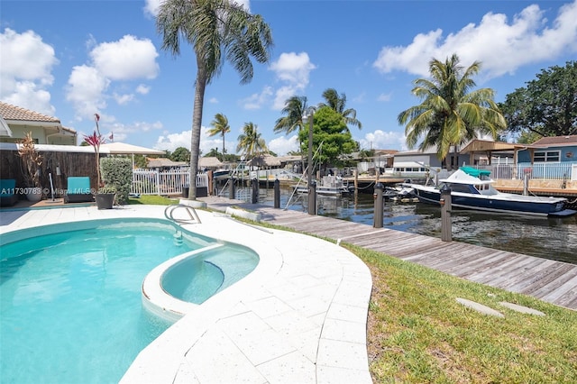 view of pool featuring a water view and a dock