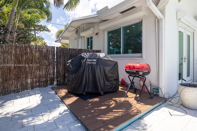 wooden deck with area for grilling