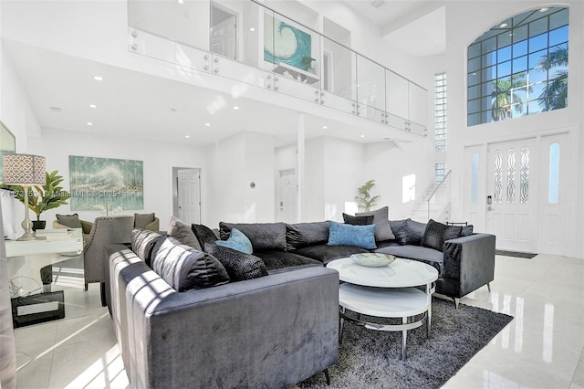 living room with a high ceiling