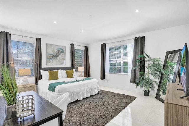 bedroom featuring light tile patterned floors