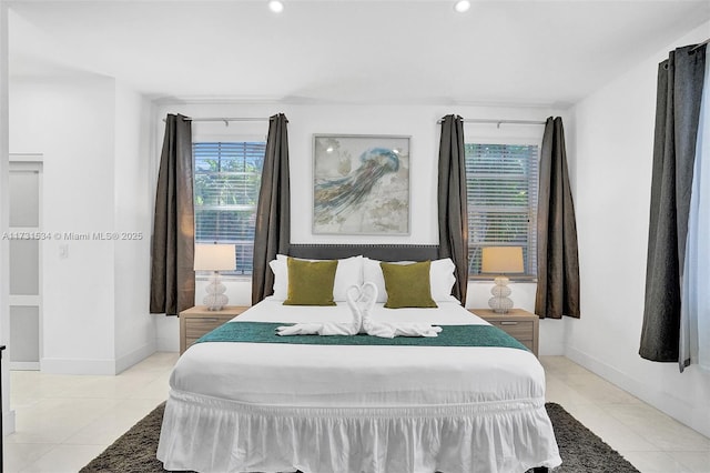 bedroom with light tile patterned flooring