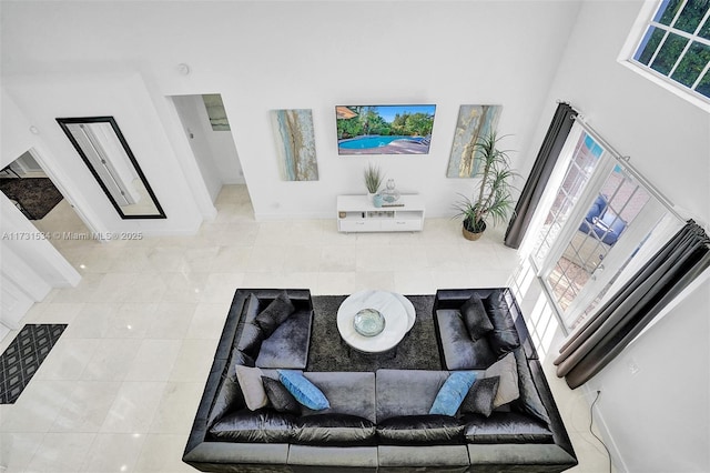 living room with tile patterned flooring