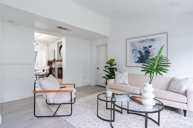 living room with light hardwood / wood-style floors