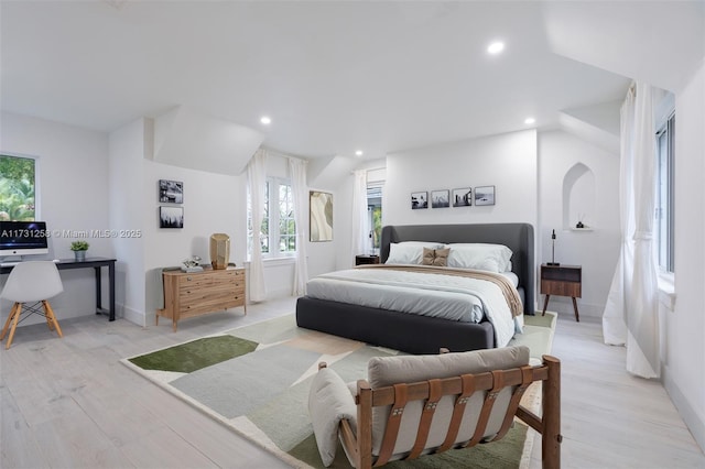 bedroom with light hardwood / wood-style floors