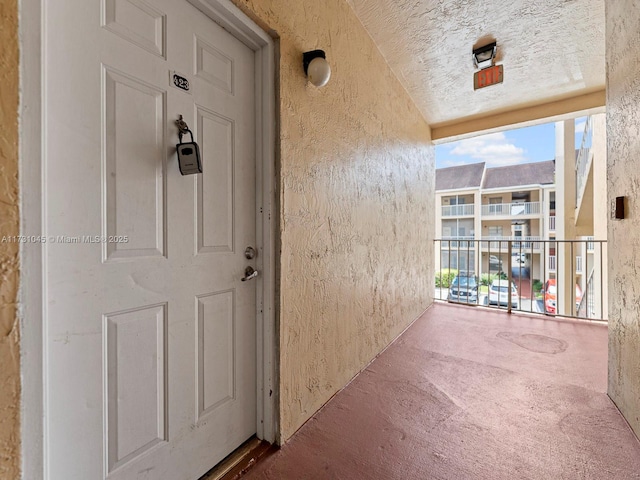 15315 SW 106th Ter Unit 423, Miami, FL 33196 - doorway to property with stucco siding and a balcony