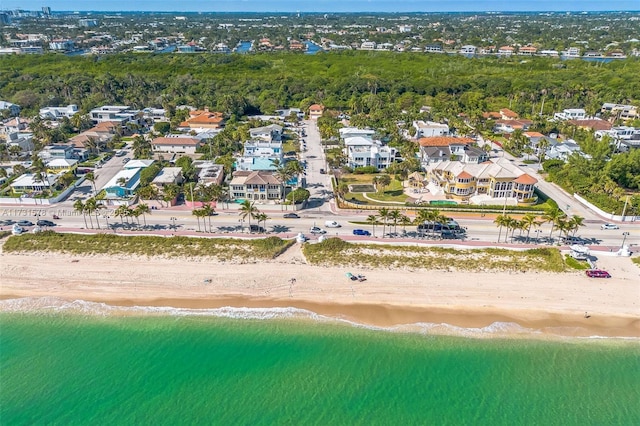 aerial view featuring a view of the beach and a water view