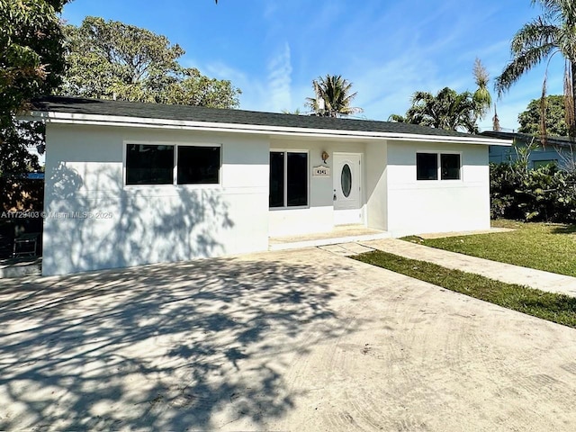 view of front facade with a patio area