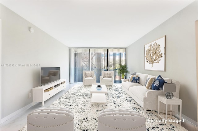 living room with floor to ceiling windows