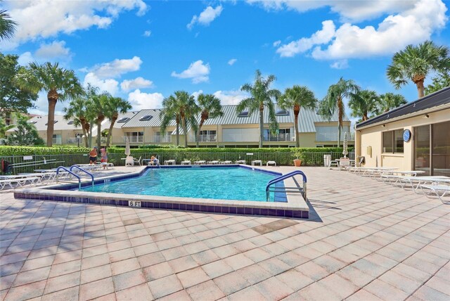 view of swimming pool featuring a patio