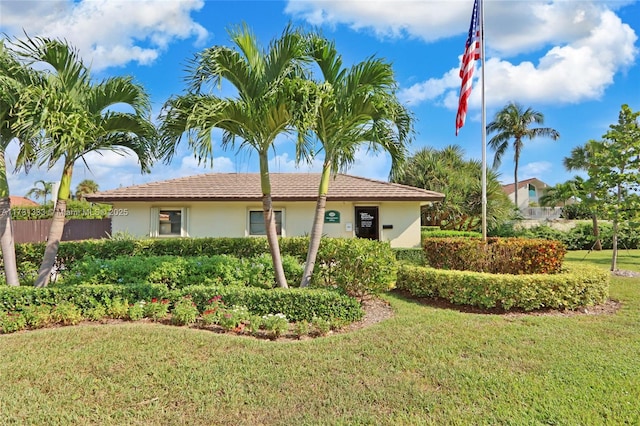 view of property exterior with a lawn