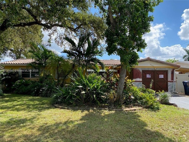 view of front of home with a front yard