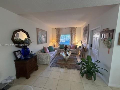 living room featuring light tile patterned floors