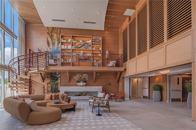 view of patio / terrace with a balcony and a water view