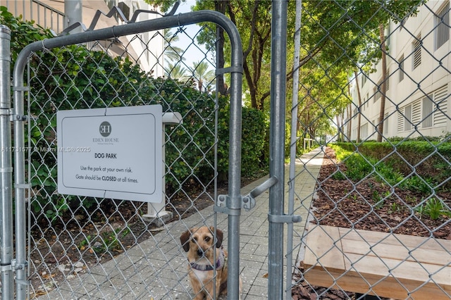 view of gate featuring fence