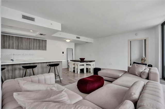 living room with light wood-type flooring