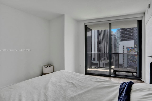 bedroom featuring expansive windows