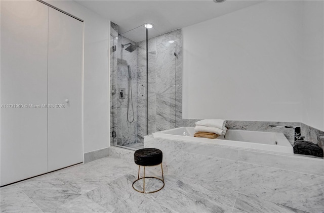 bathroom featuring plus walk in shower