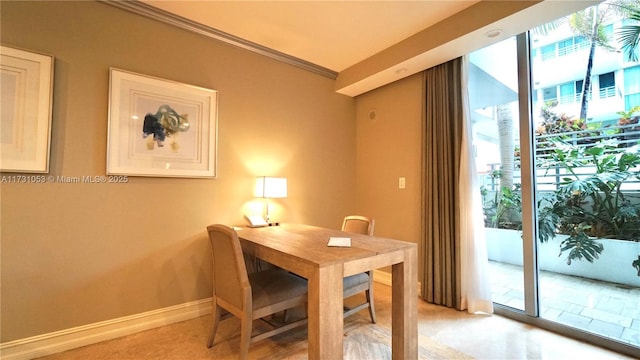 dining area featuring ornamental molding