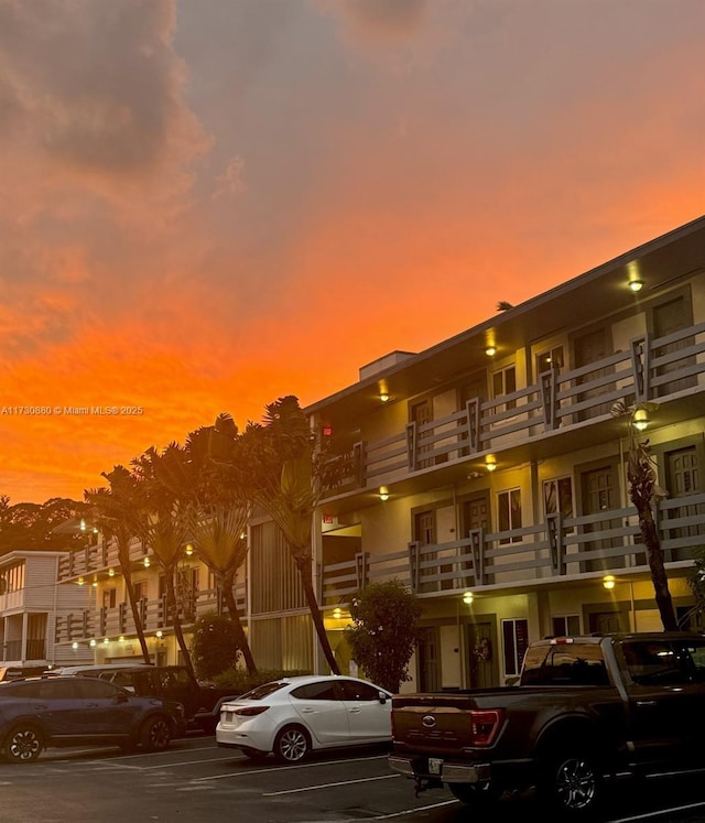 view of outdoor building at dusk