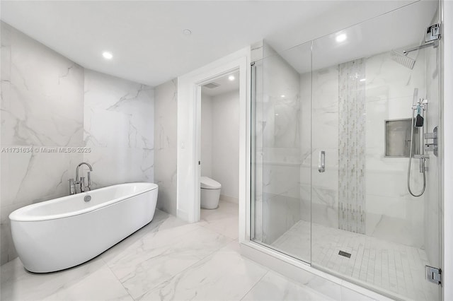 bathroom featuring toilet, separate shower and tub, and tile walls