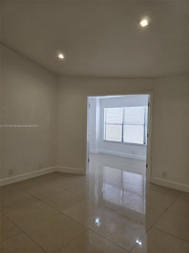 view of tiled spare room