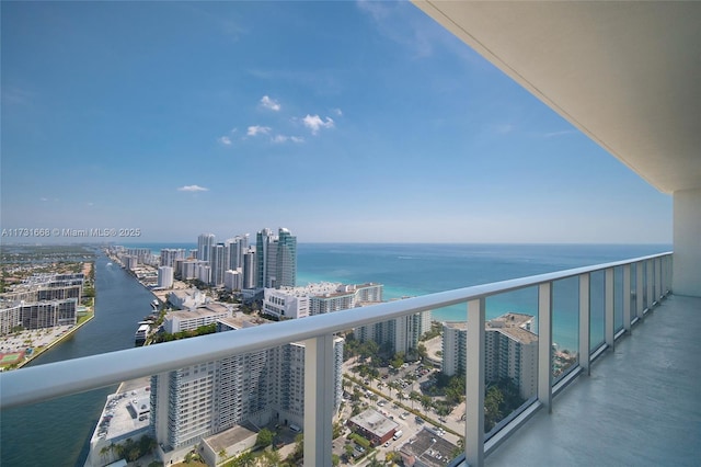 balcony featuring a water view