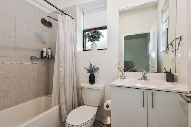 full bathroom featuring vanity, shower / bath combo with shower curtain, and toilet