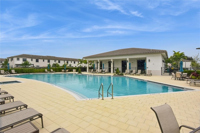 view of pool featuring a patio area