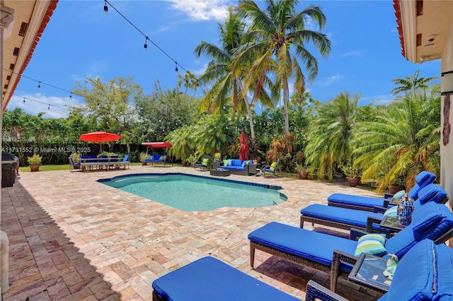 view of swimming pool featuring an outdoor hangout area and a patio