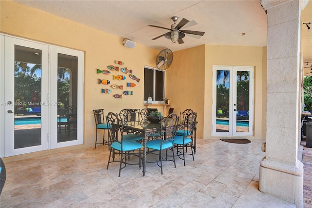 view of patio / terrace featuring french doors and ceiling fan