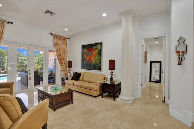 living room featuring crown molding, french doors, baseboards, visible vents, and decorative columns