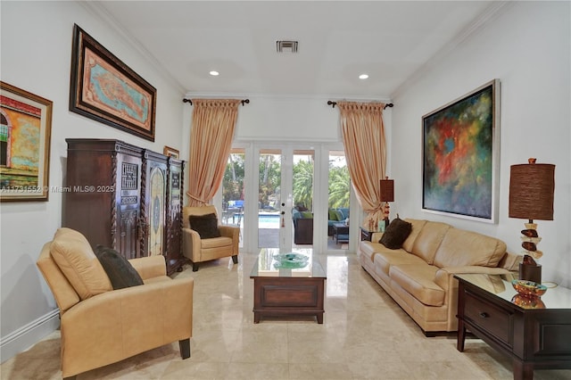 living room with ornamental molding and french doors